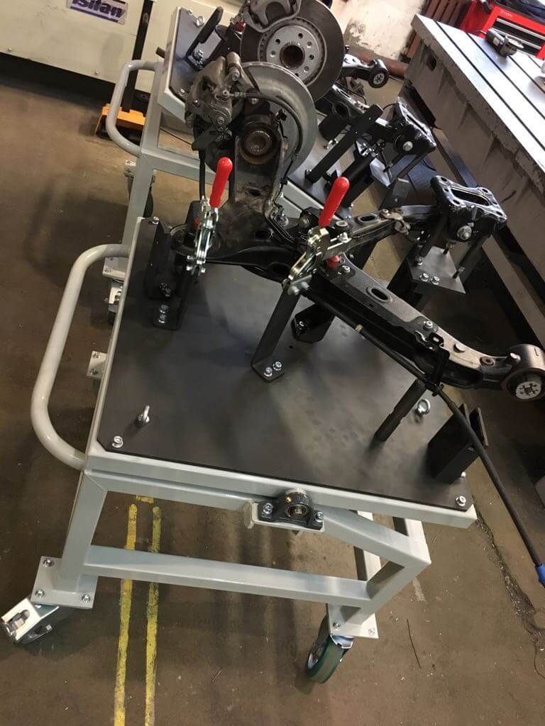 Столы для сборки задних рычагов